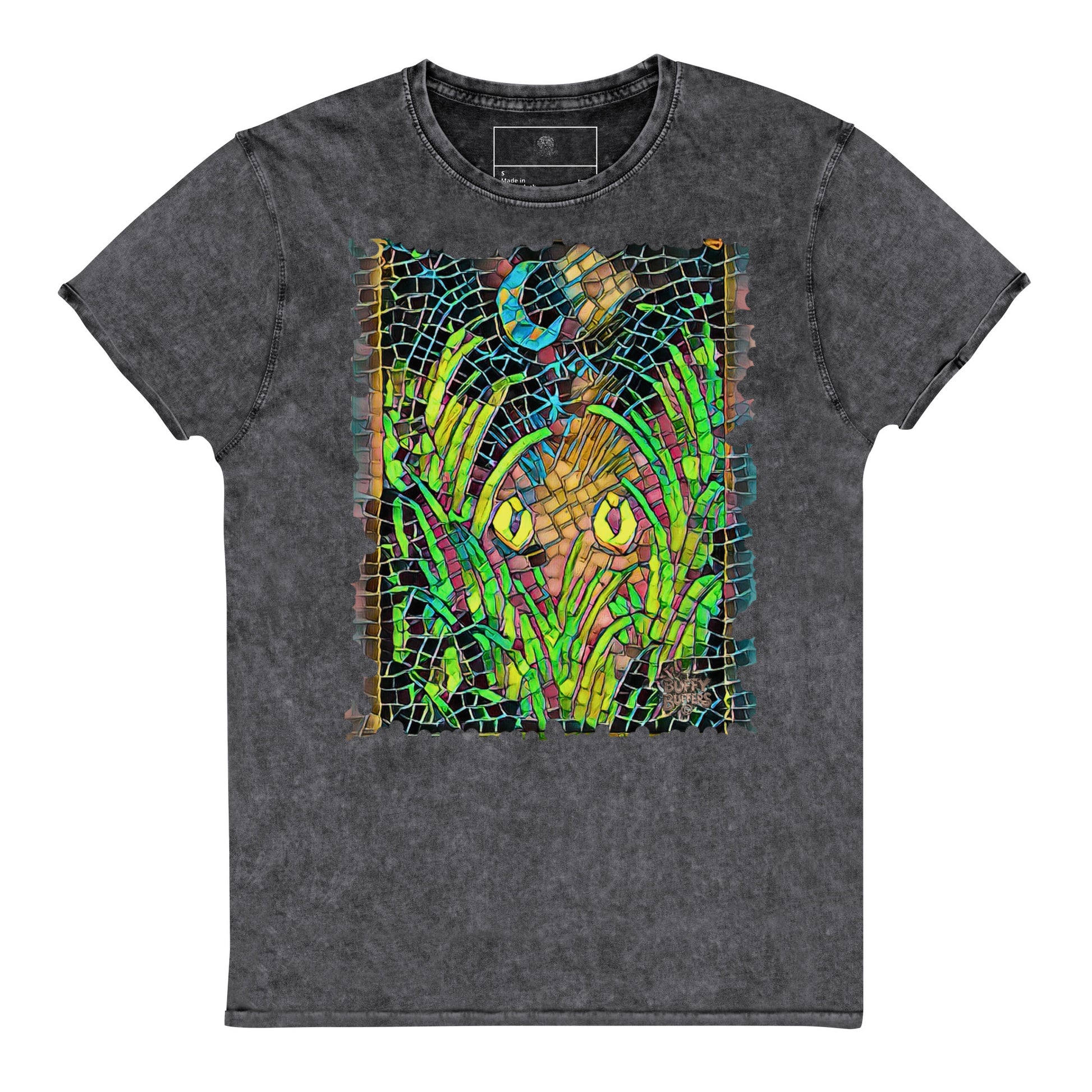 Black denim-style unisex t-shirt featuring “Midnight Watcher” artwork in Amber Collection mosaic style (glowing yellow eyes in green grass under a crescent moon)
