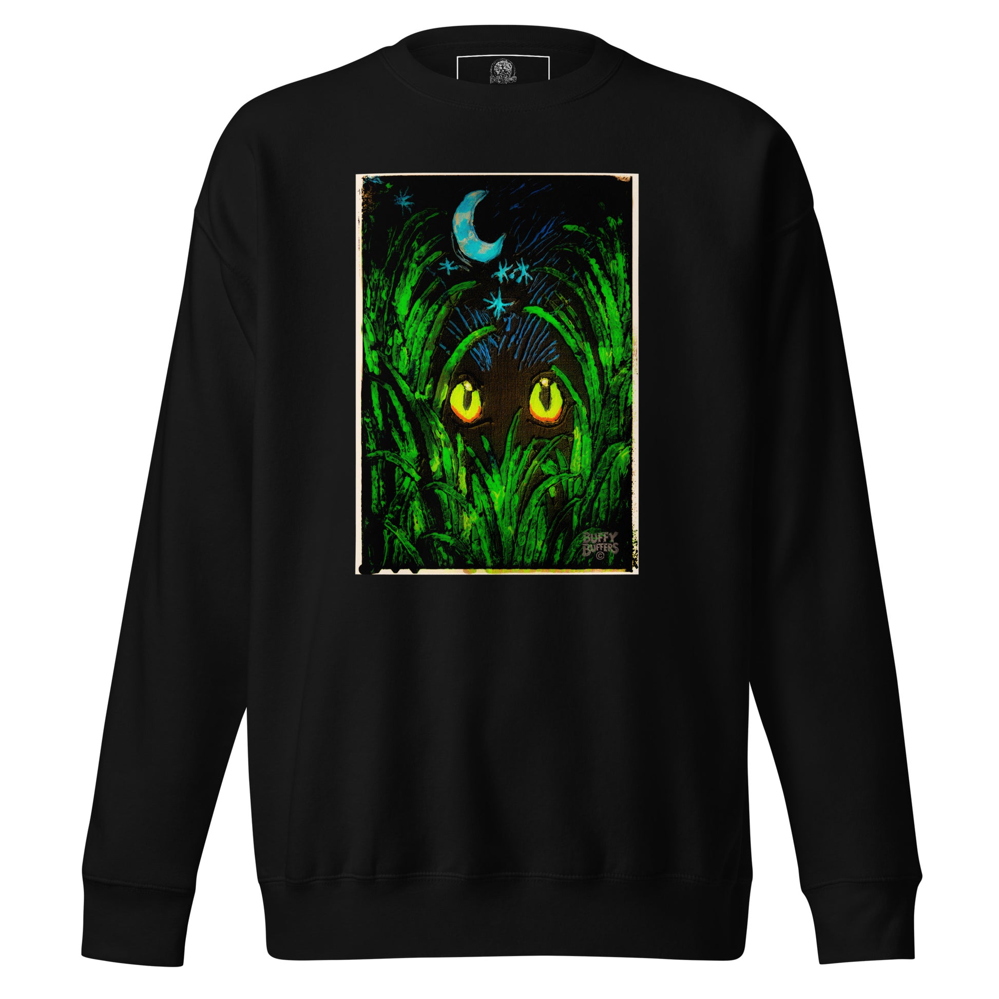 Black unisex premium sweatshirt featuring "Midnight Watcher" artwork – glowing yellow eyes in green grass under a crescent moon (Canva Collection)
