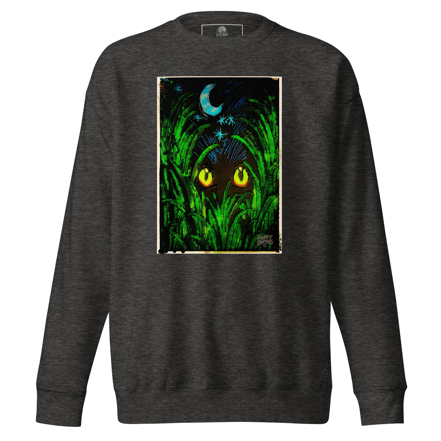 Charcoal heather unisex premium sweatshirt featuring "Midnight Watcher" artwork – glowing yellow eyes in green grass under a crescent moon (Canva Collection)