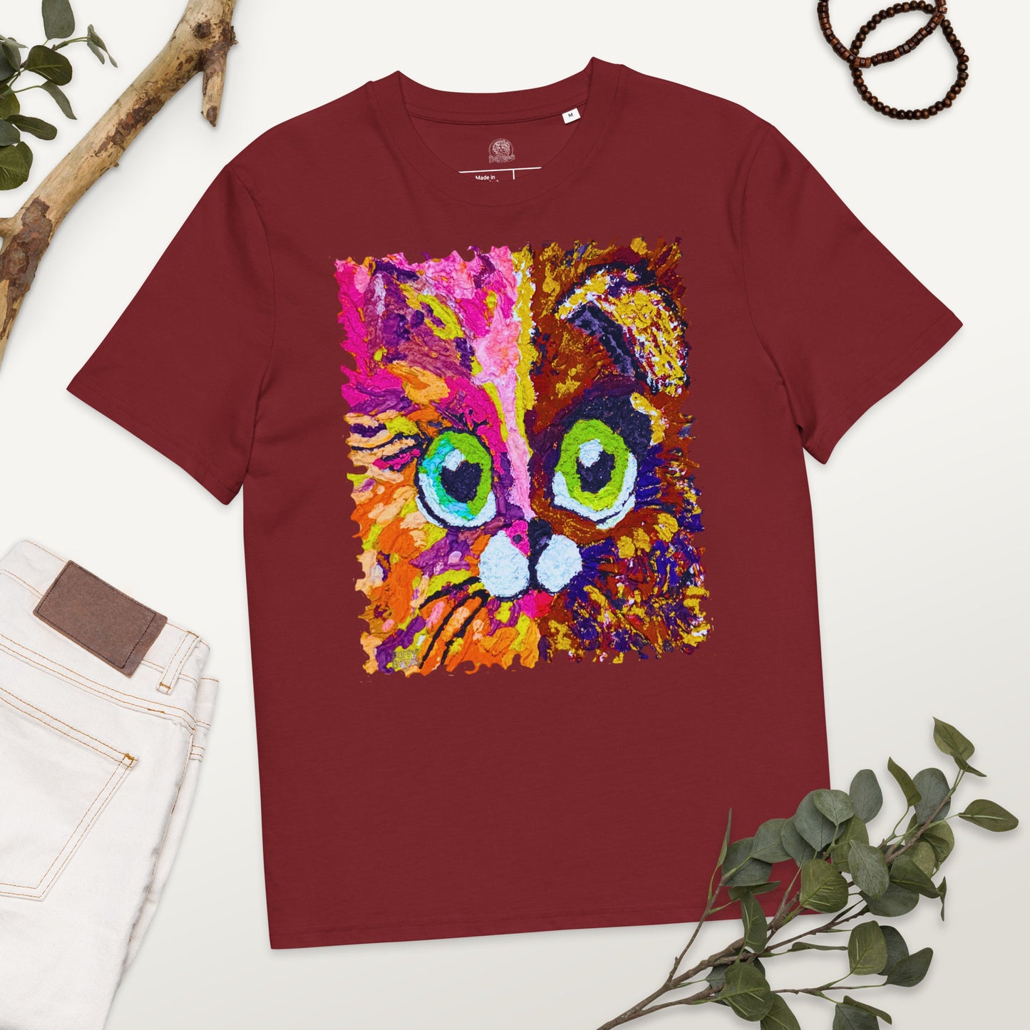 Half cat, half dog impasto portrait with bright green eyes in lively summer tones—rose, coral and golden yellow.